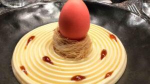 Uovo alla Catalana, su crema di passion fruit